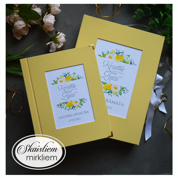 Dzeltenas krāsas kāzu komplekts — laulības apliecības vāki un viesu grāmata ar ziediem