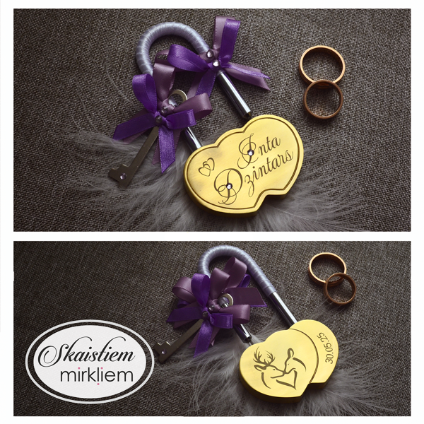 Zelta kāzu slēdzene ar gravējumu "Inta un Dzintars", dekorēta ar brieža pāra simbolu