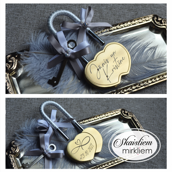 Gravēta sirds formas slēdzene "Jānis un Kristīne" ar pelēku satīna lentīti