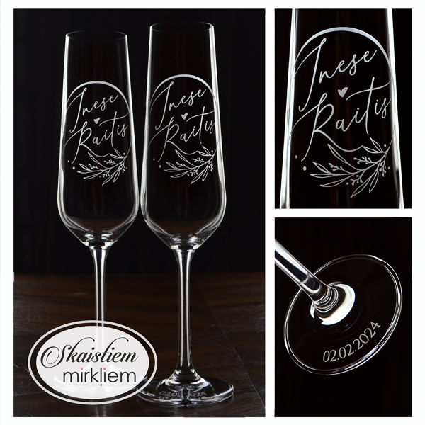 Elegants gravējums Inesei un Raitim ar smalku lapu vītnes motīvu un vijīgu fontu