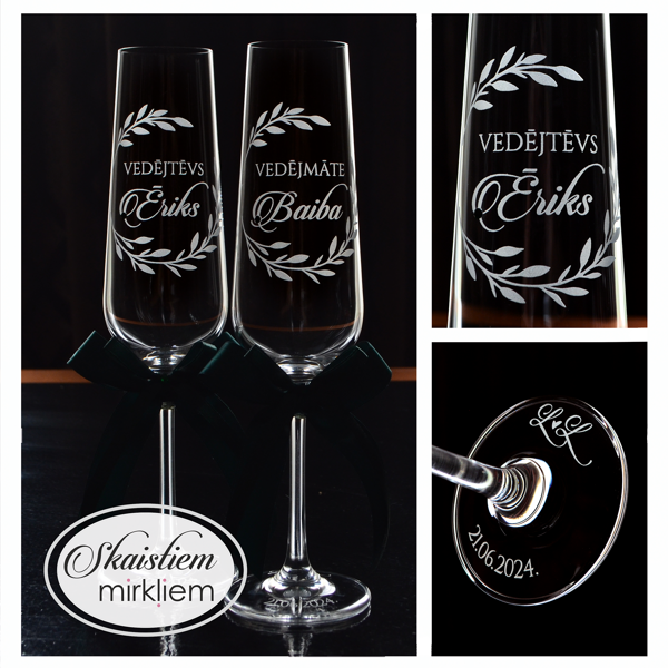 Elegants gravējums vedējiem Baibai un Ērikam ar lapu motīvu un datumu