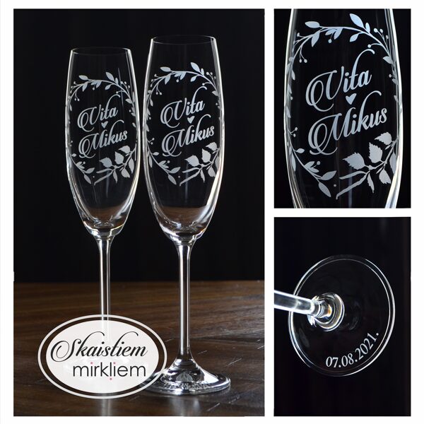 Elegants gravējums Vitai un Mikum ar kuplu lapu vainagu, bērza zariņu un datumu