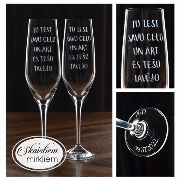 Kāzu glāžu gravējums ar tekstu "Tu iesi savu ceļu un arī es tešu tavējo"