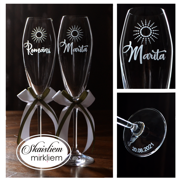 Kāzu glāzes Romānam un Maritai ar saules zīmes logo