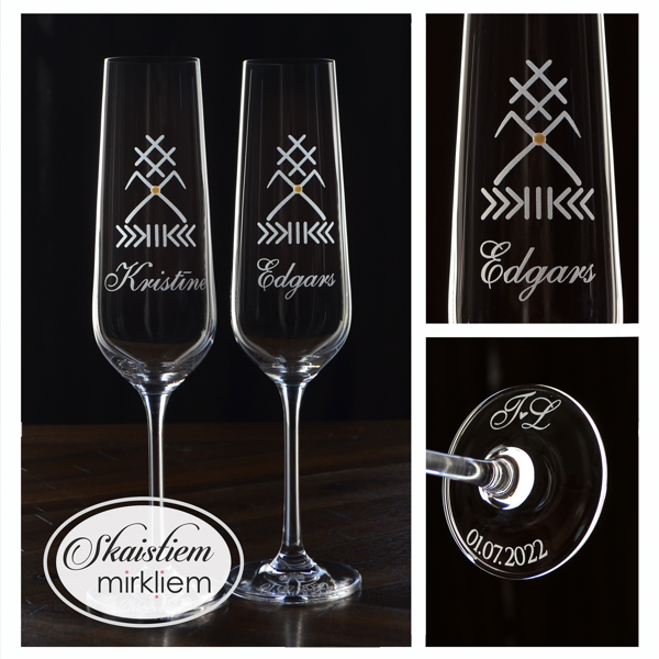 Elegants gravējums Kristīnei un Edgaram ar latvju rakstu zīmi "Jumis" auglībai un laimei