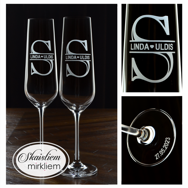 Moderns gravējums ar iniciāli S, kuros iestrādāti pilni vārdi Linda un Uldis