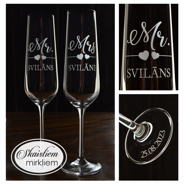 Personalizētas kāzu glāzes ar uzrakstiem "Mr.", "Mrs.", uzvārdu Svilāns un sirsniņām