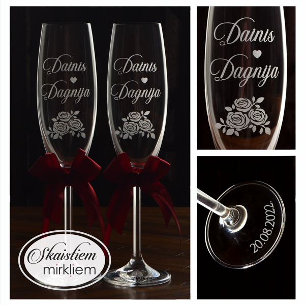 Kāzu šampanieša glāzes ar rožu gravējumu un vārdiem Dainis un Dagnija