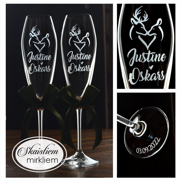 Elegants gravējums Justīnei un Oskaram ar brieža un stirnas siluetu sirds formā un lentēm