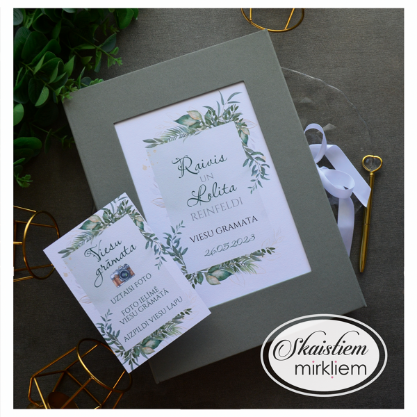 Pelēki zaļa auduma viesu grāmata ar minimālistisku zaļo lapu rāmja printu