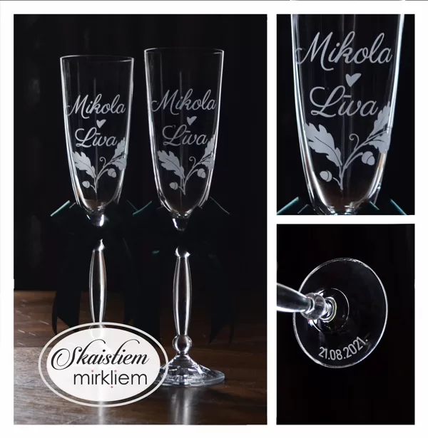 Elegants gravējums Mikolam un Līvai ar ozollapu vītni, sirds simbolu, datumu un lentēm